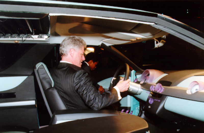 Illustration for article titled This Is How Ridiculous The Detroit Auto Show Will Look In 25 Years